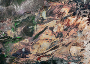 This image of the swirling landscape of Iran’s salt desert, Dasht-e Kavir, combines three Sentinel-1A SAR images from Jan., Feb., and March 2016. The brushstroke patterns are geological layers eroded mostly by wind. Changes between the acquisitions appear in bright colors – such as the blues, reds, and greens on the left half of the image. The colors show fluctuations in the amount of water. ESA 2016, contains modified Copernicus Sentinel data 2016, processed by ESA.
