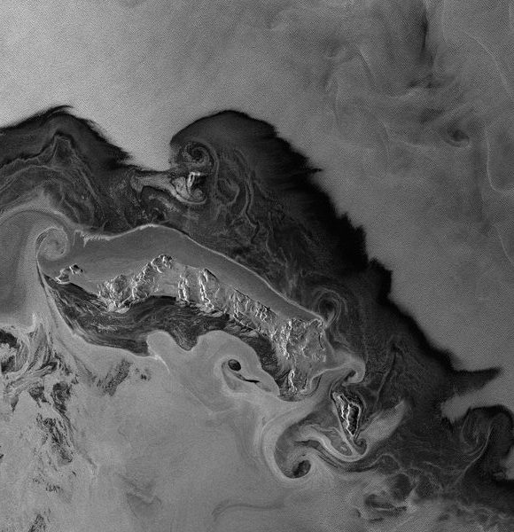 Dipole eddies swirl in the vicinity of the Bering Sea's Sarichef Strait, between Hall and St. Matthew Islands, in this ERS-1 image acquired on 15 February 1992. The eddies are tidal generated and were observed only when frazil (slush-like ice) and grease ice acted as tracers. © ESA, 1992