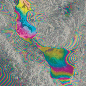 This ALOS PALSAR interferogram was used to generate a digital elevation model of Death Valley, California. The fringes (full cycle of colors) in the image are changes in interferometric phase and correspond to variations in surface topography. The long spatial baseline of this interferogram causes strong sensitivity to topography changes and yields a dense fringe pattern in steep areas. Interferogram courtesy of Franz Meyer, UAF. Includes Material © JAXA, METI 2007