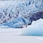 Icebergs float from the calving Mendenhall glacier, which originates in Alaska's Coast Range. The glacier velocity dataset reveals that about 40 percent (approximately 20 cubic km) of ice lost annually in Alaska is due to calving alone, mostly from a few coastal glaciers. © UAF