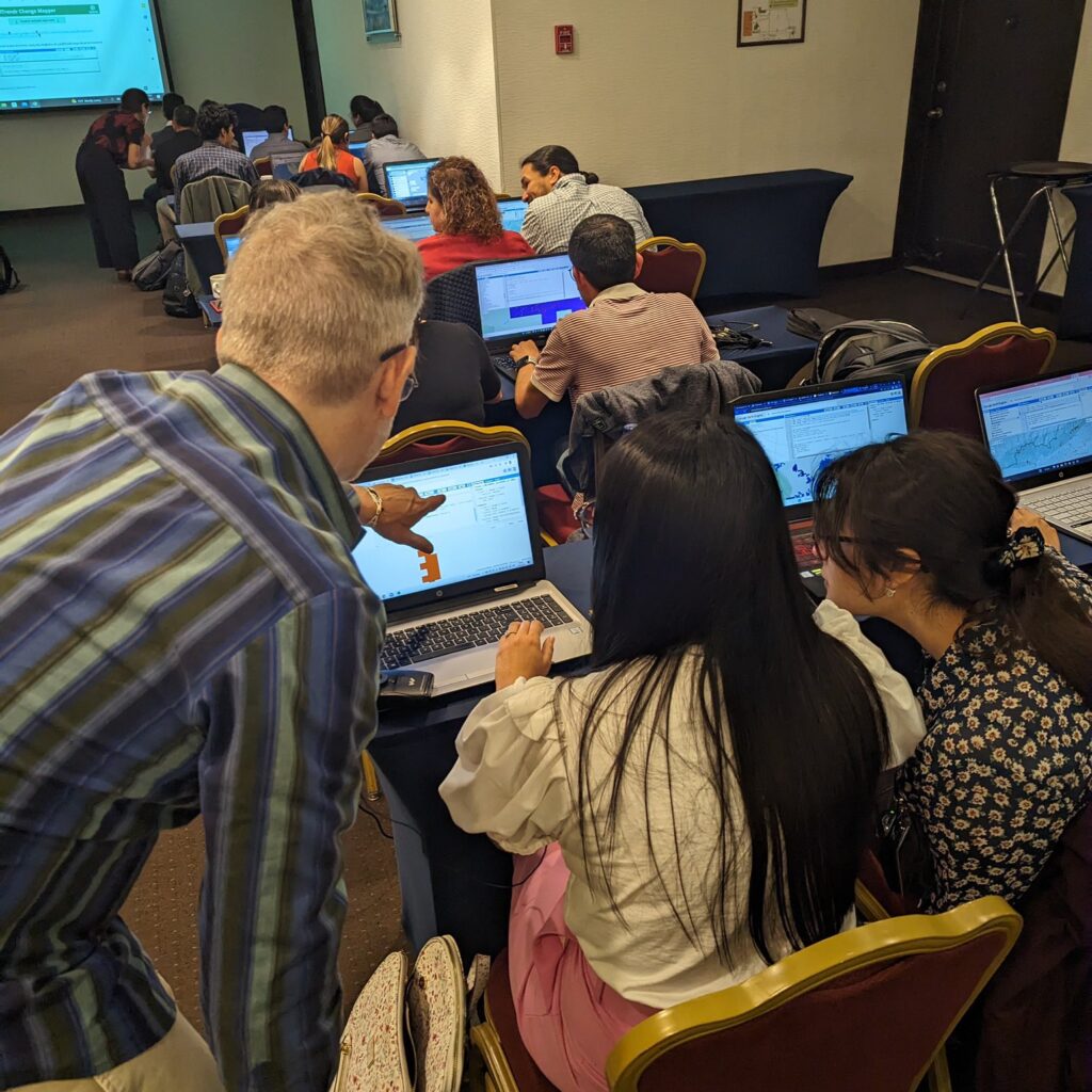 Photo of ASF Scientist instructing students in an OpenScienceLab classroom setting