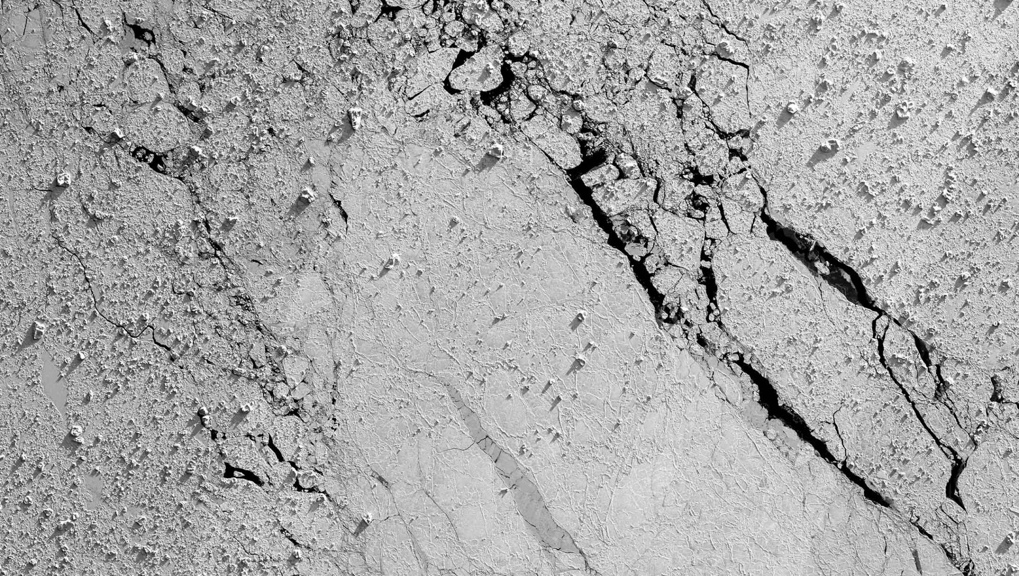 Image of pack ice in the Weddell Sea was taken with the downward-looking camera. Details in the ice surface are accentuated by the sunlight of the Antarctic spring.