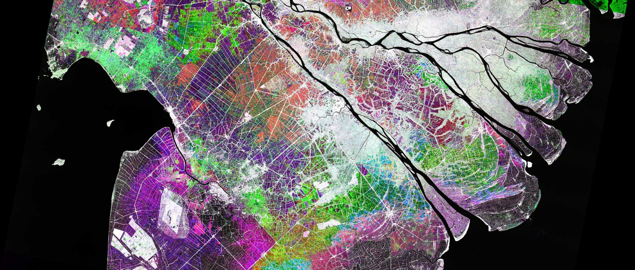 This multi-temporal RGB composite uses three images of the Mekong Delta acquired at different times during the year. The colorful pixels represent temporal variation, while white-to-black pixels are areas that have not experienced significant change.